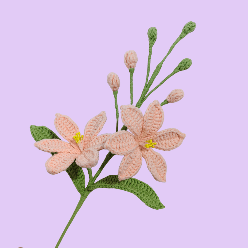 Crochet Mars Orchid flower PDF pattern with pink orchid blooms, buds, green leaves and long stems
